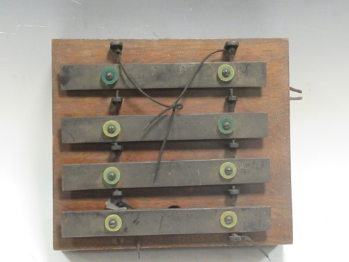 Lot 130 - An early 20th century four-bar zylophone