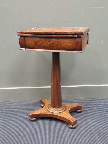 Lot 448 - A small mid-nineteenth century fold over table...