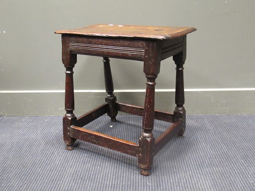 Lot 515 - A late 17th Century oak joint stool, 51cm high...
