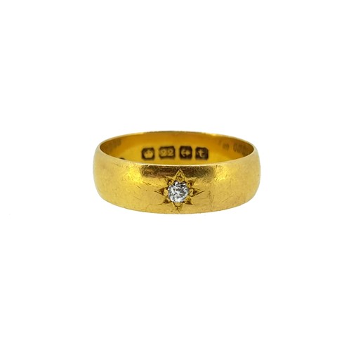 Lot 87 - An early 20th century 22ct gold diamond set band