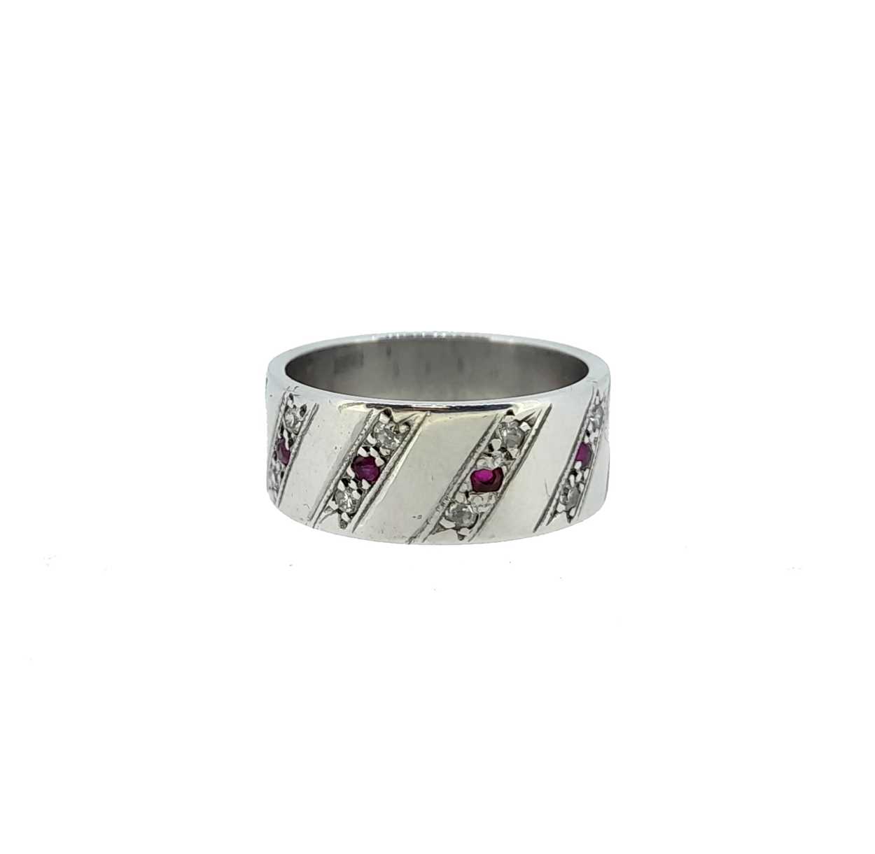 Lot 49 - An 18ct white gold ruby and diamond set ring