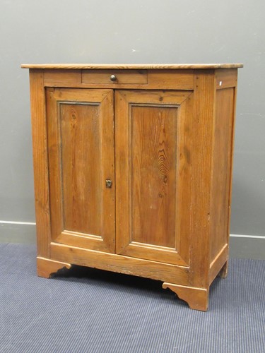 Lot 432 - A French pine side cabinet fitted a frieze...