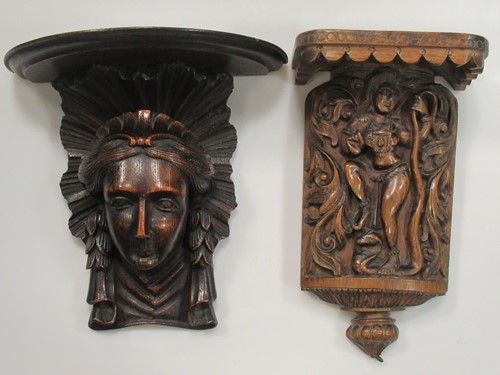 Lot 72 - An Indian style carved hardwood figural wall...