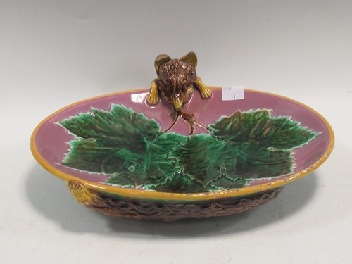 Lot 77 - A George Jones oval dish moulded with a fox,...