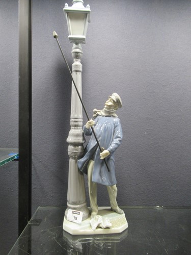 Lot 78 - A Lladro figure of a lamplighter 46cm high and...