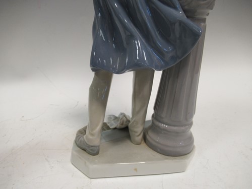 Lot 78 - A Lladro figure of a lamplighter 46cm high and...