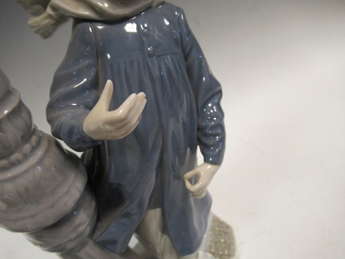 Lot 78 - A Lladro figure of a lamplighter 46cm high and...