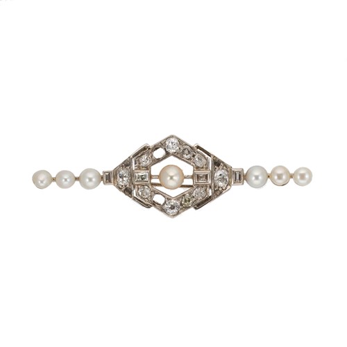 Lot 181 - An Art Deco diamond and pearl bar brooch