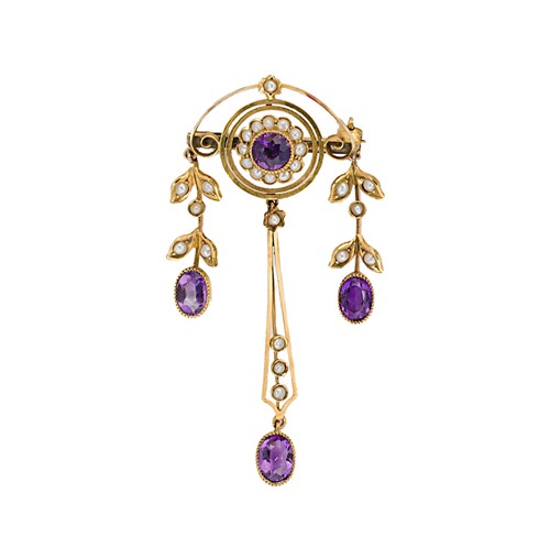 Lot 64 - An Art Nouveau amethyst and split pearl brooch