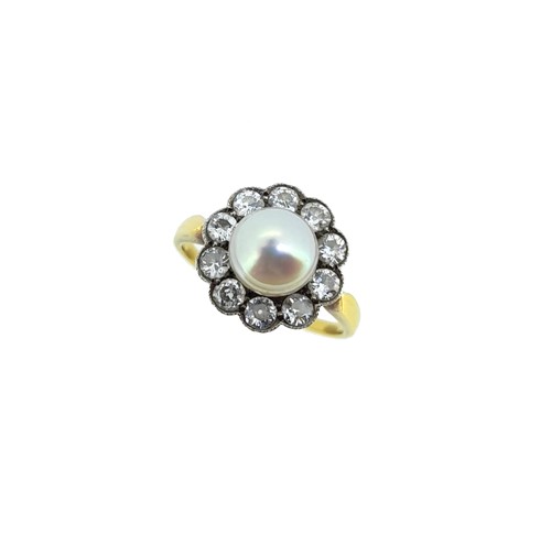 Lot 152 - A mid 20th century pearl and diamond cluster ring