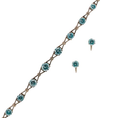 Lot 86 - A zircon bracelet and a pair of ear studs en suite