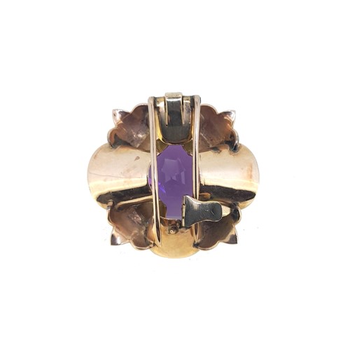 Lot 62 - An amethyst clip brooch