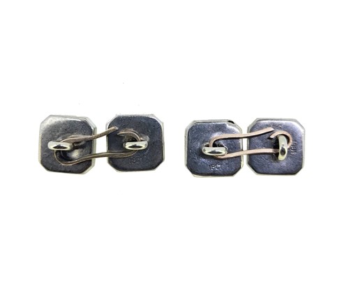 Lot 33 - A pair of onyx and diamond cufflinks