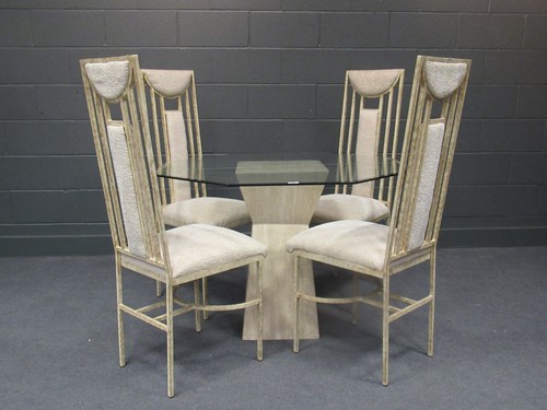 Lot 551 - A modern octagonal glass topped dining table,...