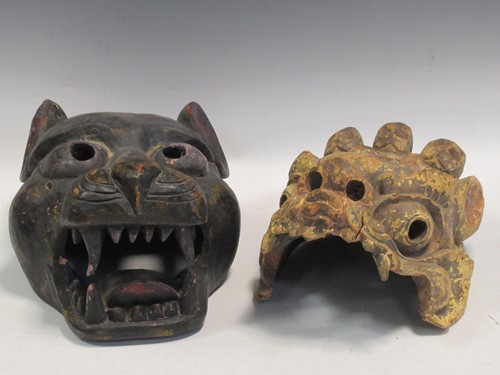 Lot 136 - A Nepalese carved hardwood head of a tiger,...
