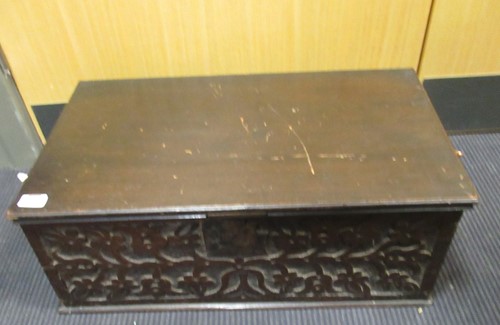 Lot 441 - A 17th century oak carved bible box, 25 x 66 x...
