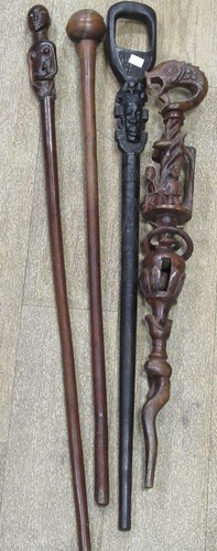 Lot 137 - A collection of carved african canes and...