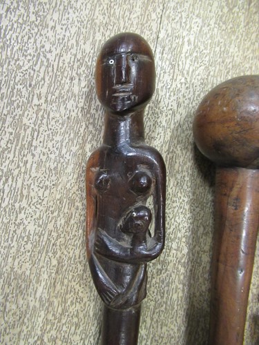 Lot 137 - A collection of carved african canes and...