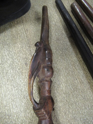 Lot 137 - A collection of carved african canes and...