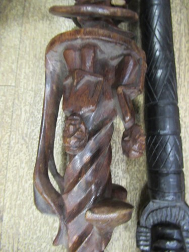 Lot 137 - A collection of carved african canes and...