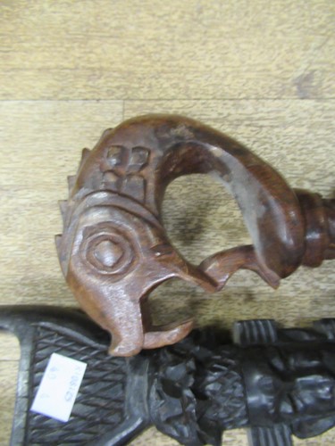 Lot 137 - A collection of carved african canes and...