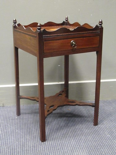 Lot 466 - A 19th century inlaid mahogany urn stand, the...
