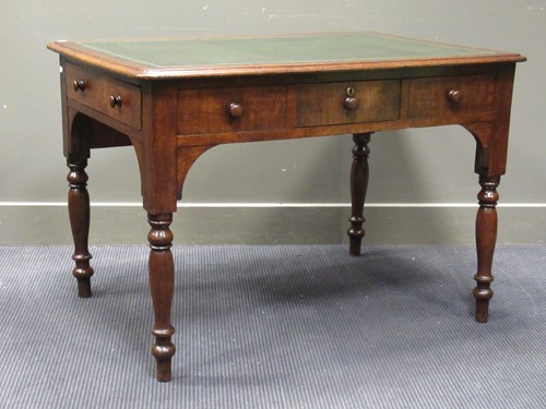 Lot 510 - Circa 1860 an oak desk, the tooled leather...