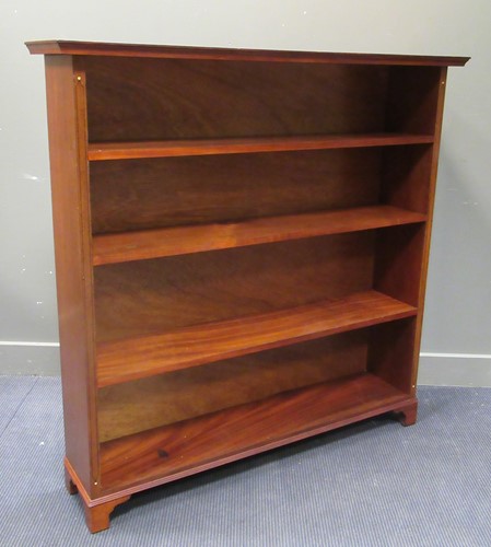 Lot 513 - A Victorian style mahogany five tier bookshelf...