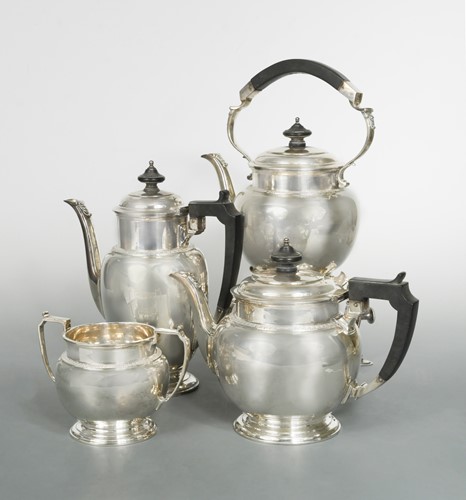 Lot 565 - A George V silver four-piece tea and coffee set