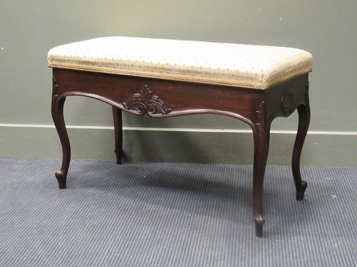 Lot 483 - Circa 1900 a mahogany duet stool, the hinged...