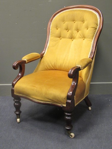 Lot 553 - Circa 1840 a spoon back mahogany armchair, the...