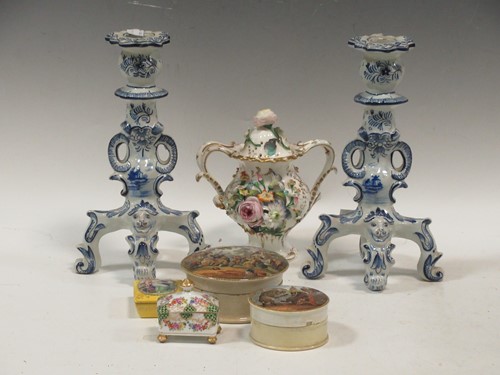 Lot 14 - A pair of blue & white faïence candlesticks,...