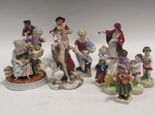 Lot 91 - A collection of Continental figures and figure...