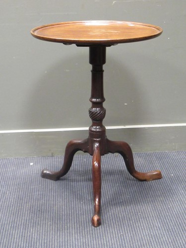 Lot 512 - A George III mahogany wine tripod table (one...