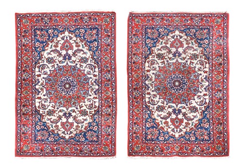 Lot 586 - A pair of finely-woven Kerman rugs, circa 1930