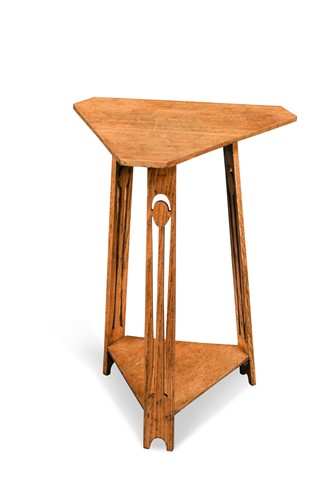 Lot 128 - An Arts and Crafts golden oak occasional table, circa 1900
