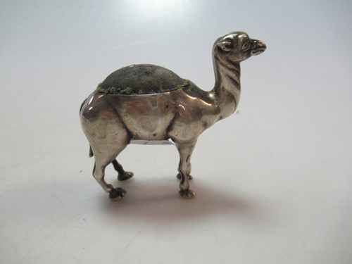 Lot 219 - A silver novelty pin cushion in the form of a...