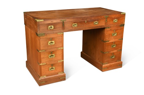 Lot 326 - An Indian campaign style teak pedestal desk, 20th century
