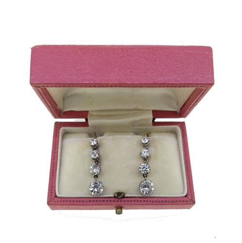 Lot 198 - A pair of early 20th century diamond ear pendants