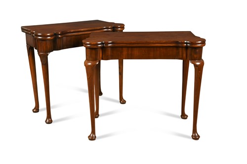 Lot 217 - A near pair of George II mahogany card tables