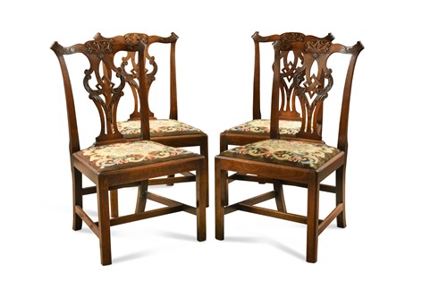 Lot 215 - A set of four George III mahogany dining chairs