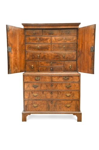 Lot 213 - A George I walnut and feather banded cabinet on chest