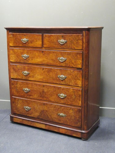 Lot 562 - A late Victorian walnut chest of two short...