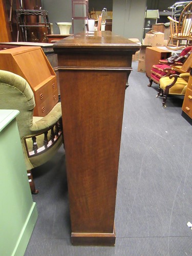 Lot 564 - A late Victorian oak open bookcase with...