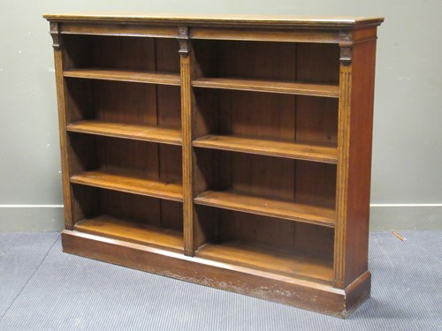 Lot 564 - A late Victorian oak open bookcase with...