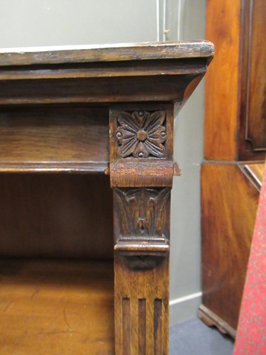 Lot 564 - A late Victorian oak open bookcase with...