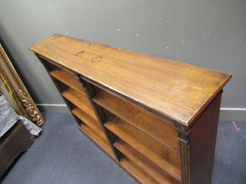 Lot 564 - A late Victorian oak open bookcase with...