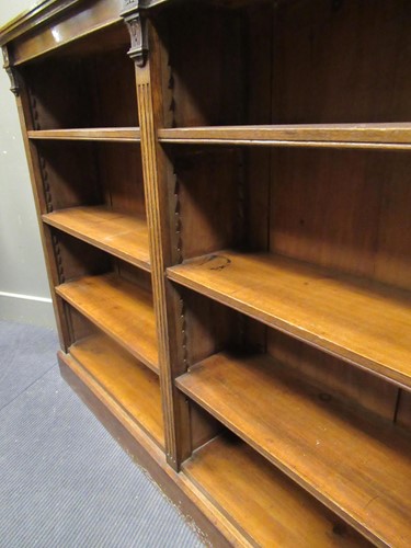 Lot 564 - A late Victorian oak open bookcase with...