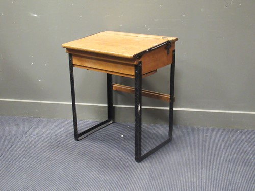 Lot 565 - An early 20th century metal framed desk 75 x...