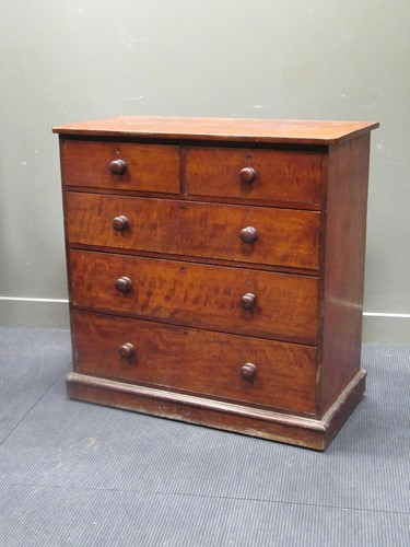 Lot 566 - A 19th century mahogany chest of two short...